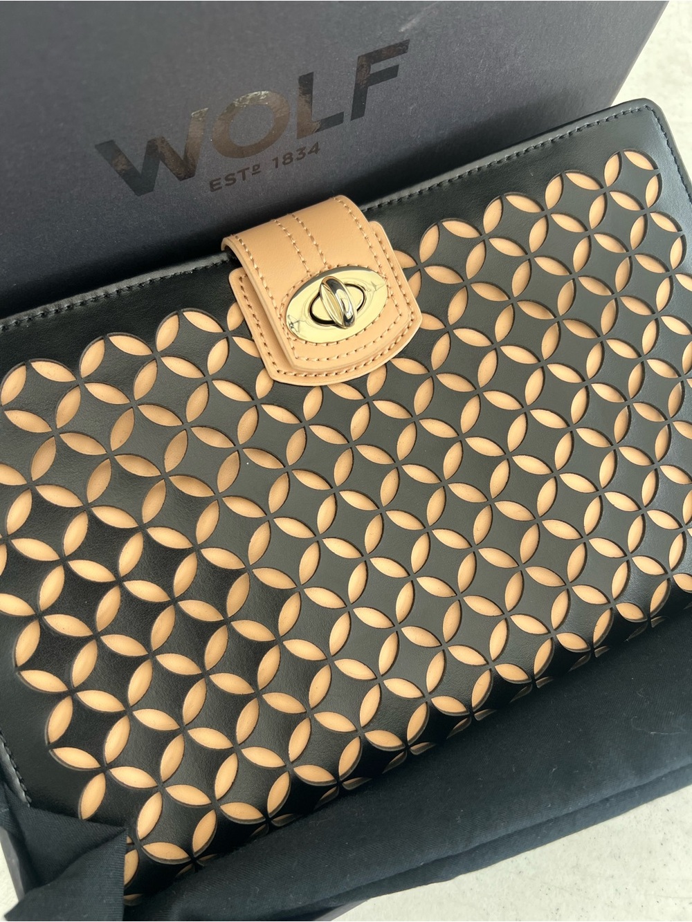 WOLF Est.1834"Chloe'Laser
Cut Leather Jewelry Portfolio
Case